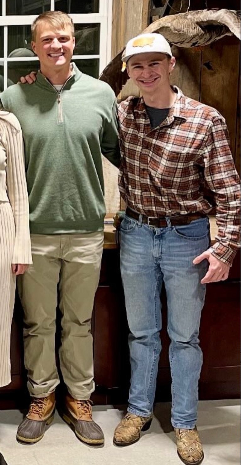 Bo and Brown Jewell, the brothers behind The Dump Bros, smiling for the camera